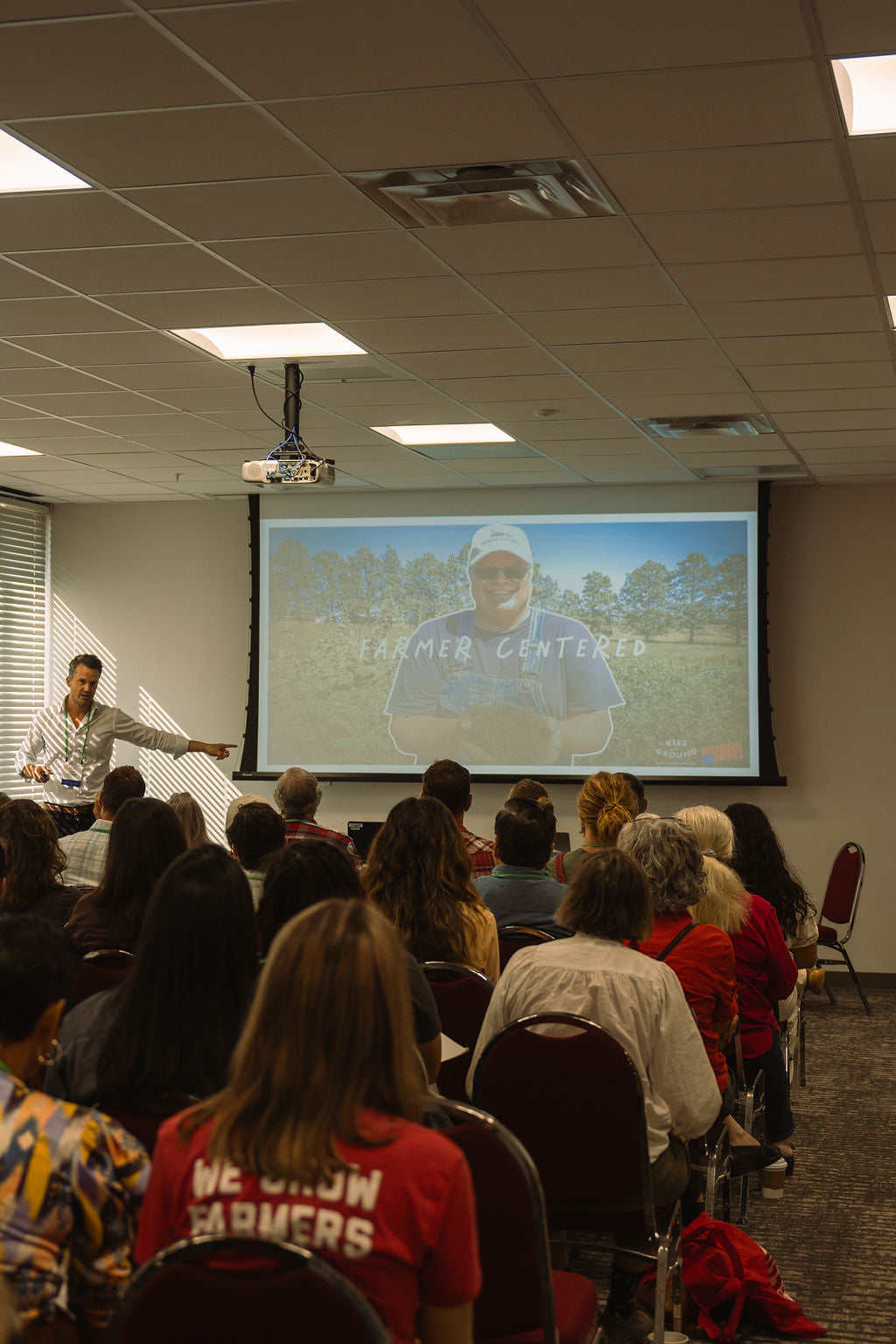 Attendees watching a presentation at the 2024 Southern Family Farmers and Food Systems Conference. Representative prior-year image, not the 2025 biodynamics panel; supplied in the conference organizers’ outreach materials.