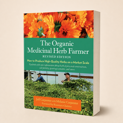 The Organic Medicinal Herb Farmer Revised Edition 416-page large-format paperback, three-quarter front view