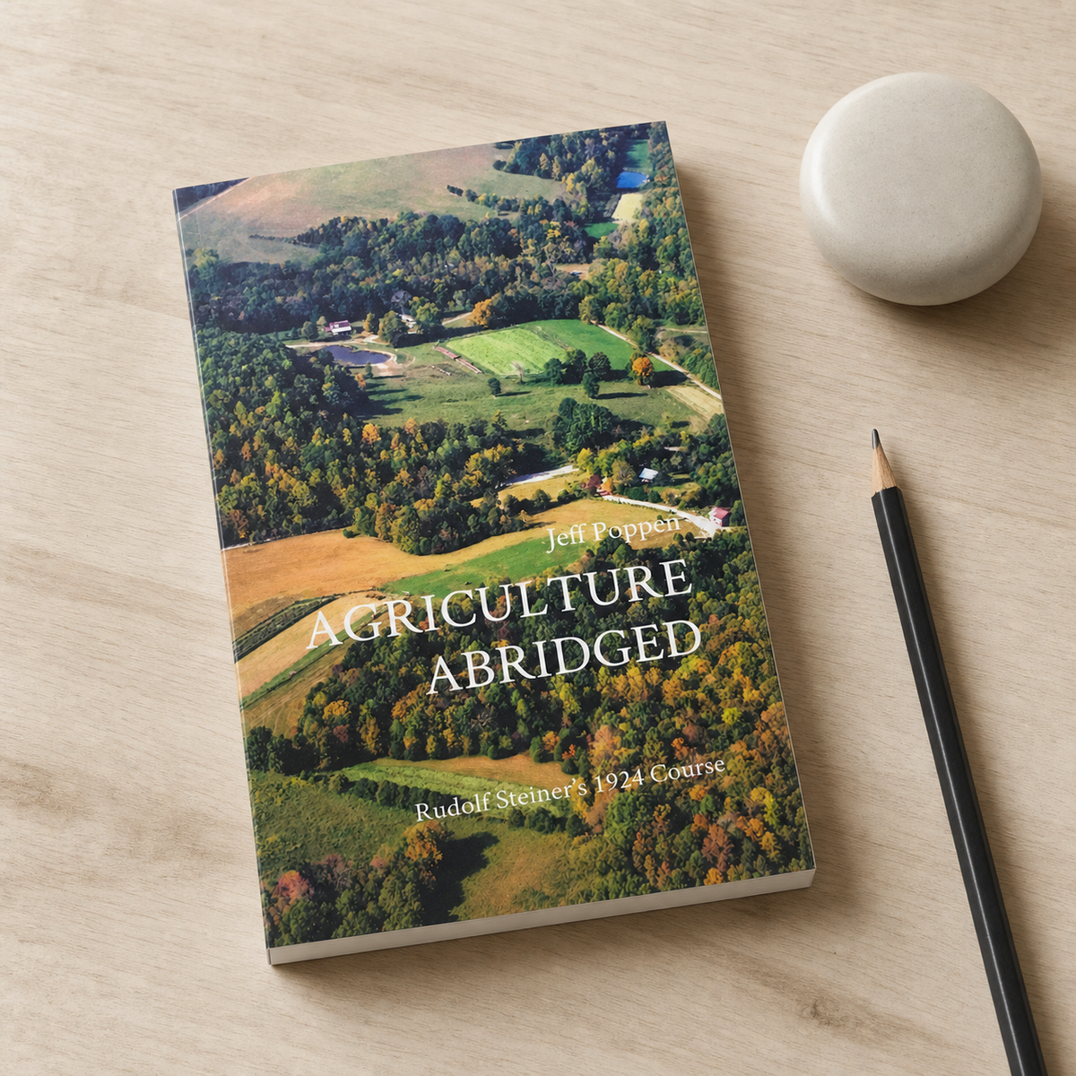 Agriculture Abridged — slim 132-page paperback in a natural reading-desk view