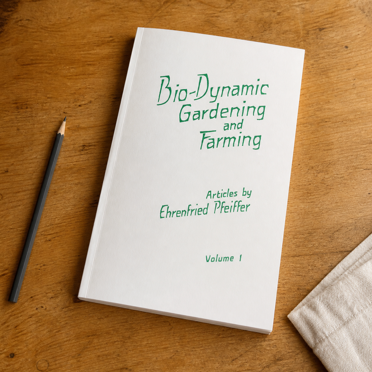 Bio-Dynamic Gardening and Farming Volume 1 — slim paperback in a natural reading-desk view