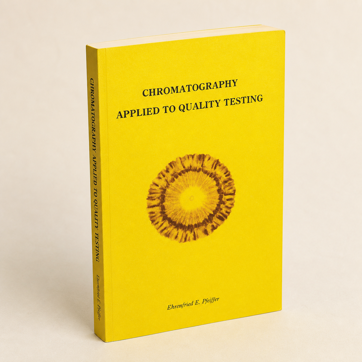 Chromatography Applied to Quality Testing paperback on a softly lit off-white background
