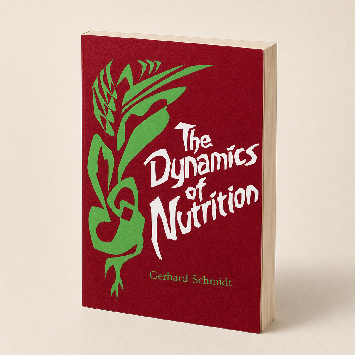 The Dynamics of Nutrition paperback on a clean off-white background