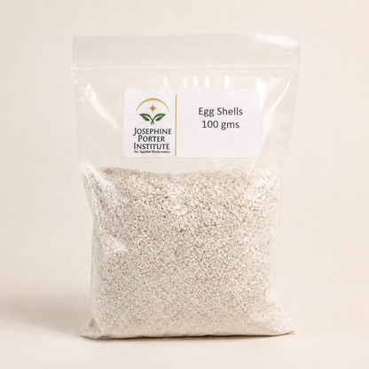 Eggshells 100 g packet on a clean off-white background