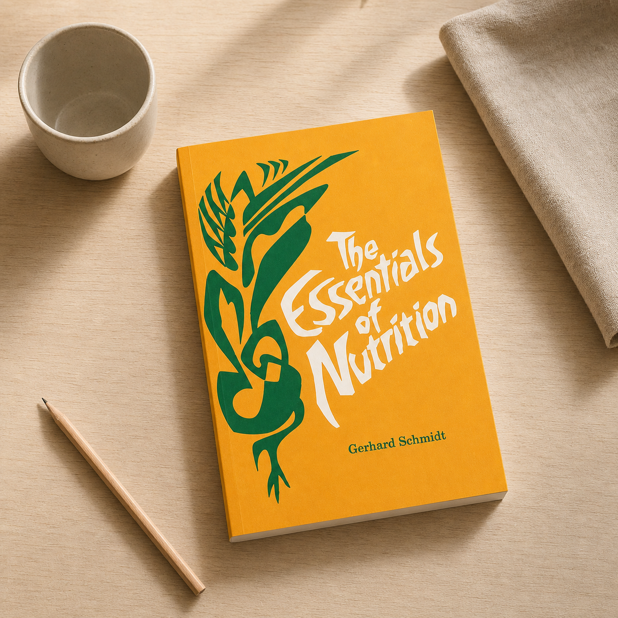 The Essentials of Nutrition paperback on a neutral reading table