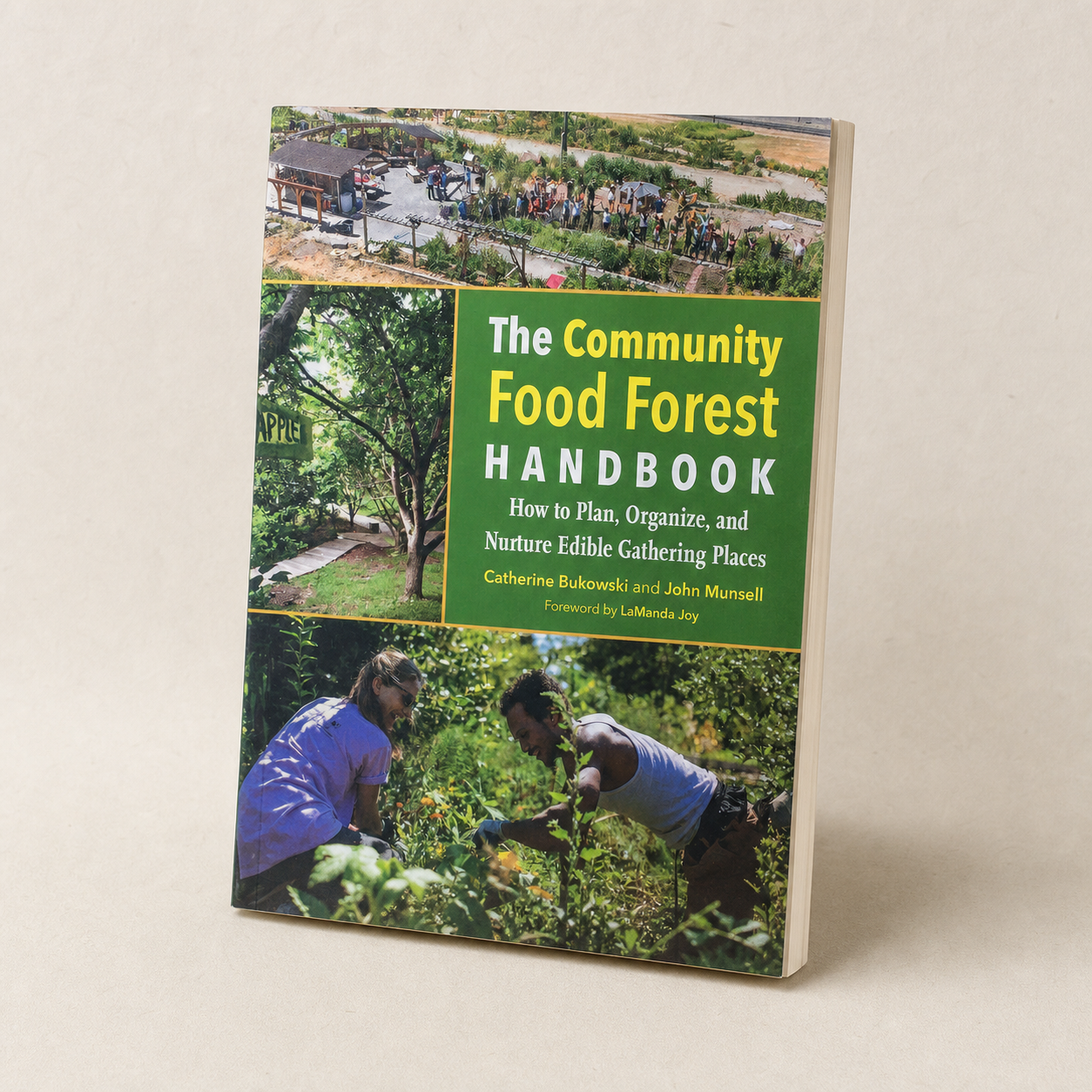 The Community Food Forest Handbook paperback, three-quarter front view