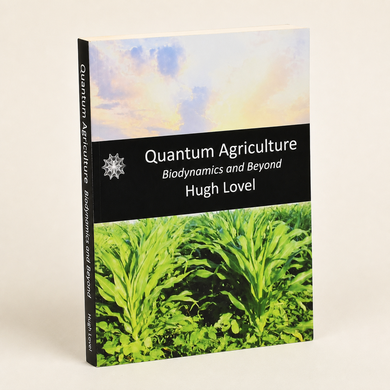 Quantum Agriculture paperback on a softly lit off-white background