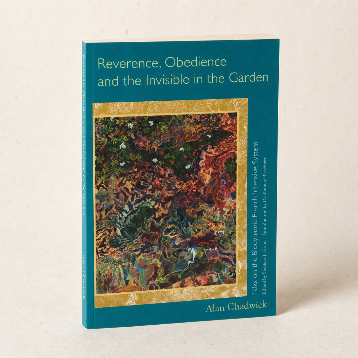Reverence, Obedience, and the Invisible in the Garden paperback on a softly lit off-white background