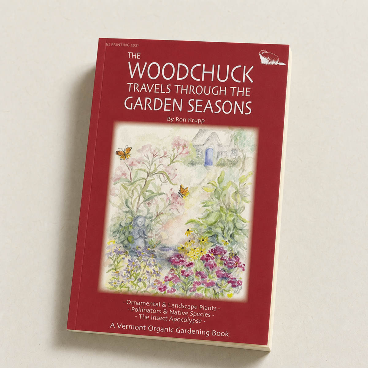 The Woodchuck Travels Through the Garden Seasons paperback, three-quarter front view